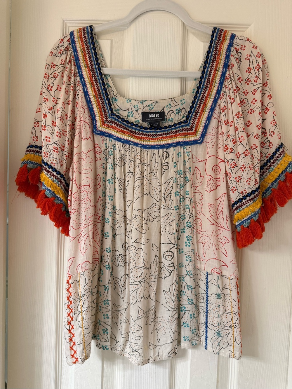 Anthropologie Cream Floral Embroidered Peasant Top with Red Tassels